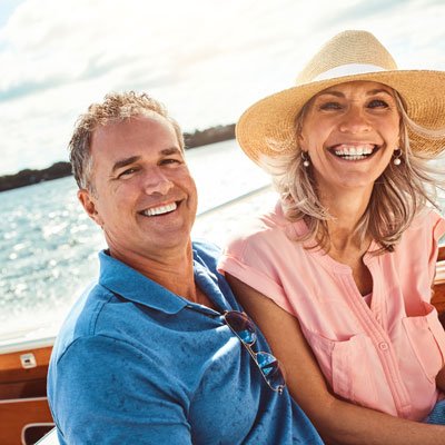 couple with dental implants image