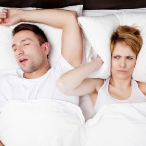 man snoring with sleep apnea image